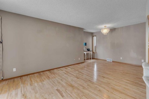 710 Coral Springs Boulevard Ne, Calgary, AB - Indoor Photo Showing Other Room
