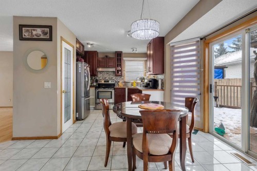 710 Coral Springs Boulevard Ne, Calgary, AB - Indoor Photo Showing Dining Room