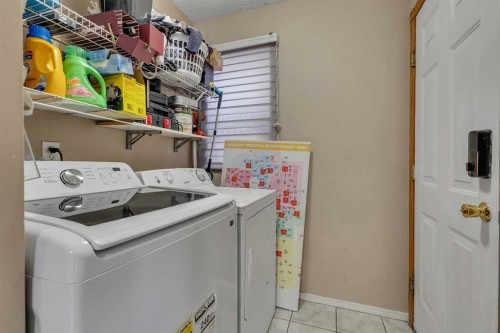 710 Coral Springs Boulevard Ne, Calgary, AB - Indoor Photo Showing Laundry Room