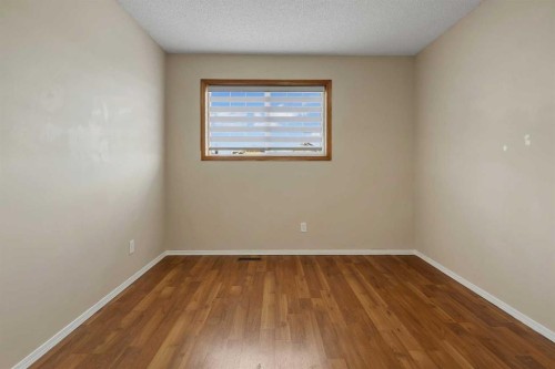 710 Coral Springs Boulevard Ne, Calgary, AB - Indoor Photo Showing Other Room