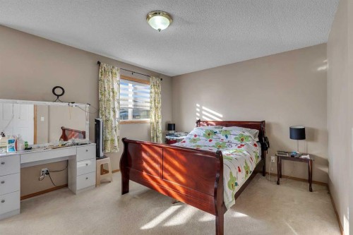 710 Coral Springs Boulevard Ne, Calgary, AB - Indoor Photo Showing Bedroom