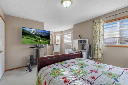 710 Coral Springs Boulevard Ne, Calgary, AB - Indoor Photo Showing Bedroom