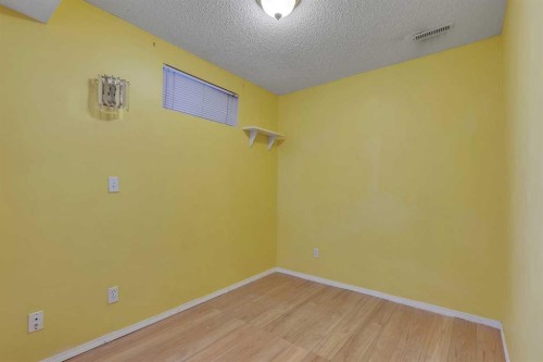 710 Coral Springs Boulevard Ne, Calgary, AB - Indoor Photo Showing Other Room