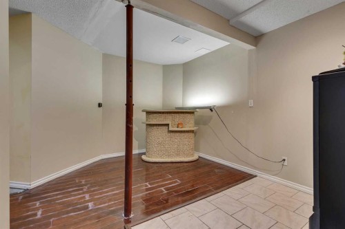 710 Coral Springs Boulevard Ne, Calgary, AB - Indoor Photo Showing Other Room