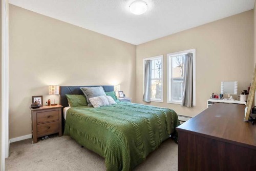 321-402 Marquis Lane Se, Calgary, AB - Indoor Photo Showing Bedroom