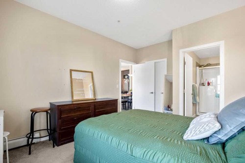 321-402 Marquis Lane Se, Calgary, AB - Indoor Photo Showing Bedroom