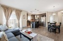 321-402 Marquis Lane Se, Calgary, AB  - Indoor Photo Showing Living Room 