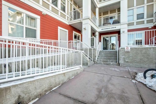 321-402 Marquis Lane Se, Calgary, AB - Outdoor With Balcony