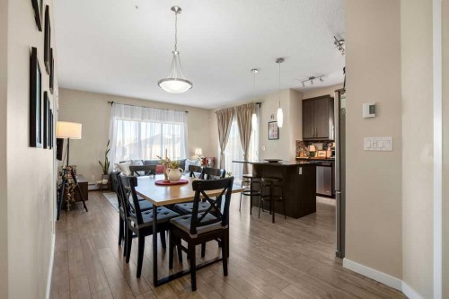 321-402 Marquis Lane Se, Calgary, AB - Indoor Photo Showing Dining Room