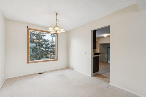 219 Silvercreek Close Nw, Calgary, AB - Indoor Photo Showing Other Room