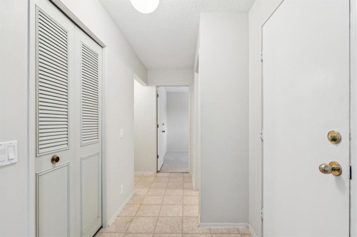 219 Silvercreek Close Nw, Calgary, AB - Indoor Photo Showing Other Room