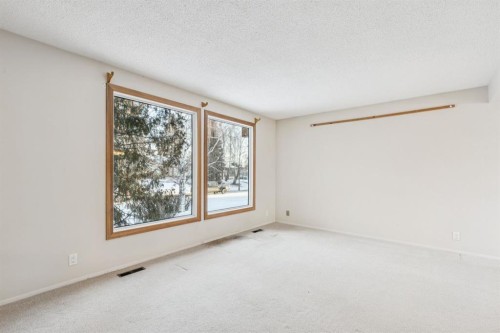 219 Silvercreek Close Nw, Calgary, AB - Indoor Photo Showing Other Room