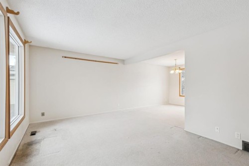 219 Silvercreek Close Nw, Calgary, AB - Indoor Photo Showing Other Room