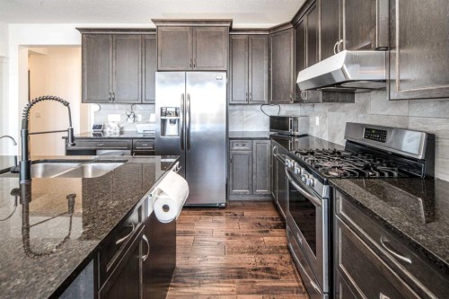 498 Sherwood Boulevard Nw, Calgary, AB - Indoor Photo Showing Kitchen With Double Sink With Upgraded Kitchen