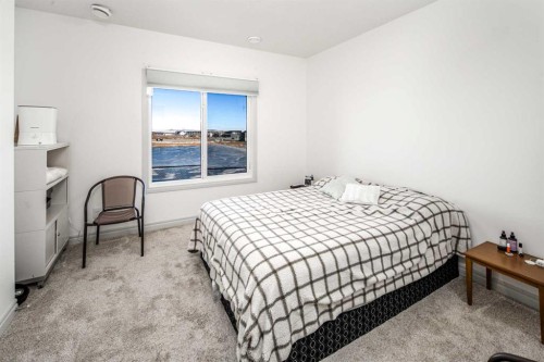 498 Sherwood Boulevard Nw, Calgary, AB - Indoor Photo Showing Bedroom