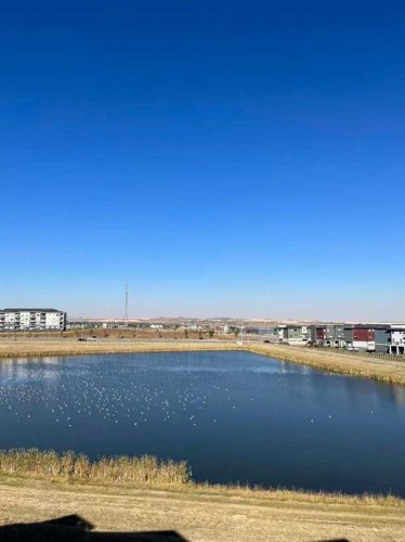 498 Sherwood Boulevard Nw, Calgary, AB - Outdoor With Body Of Water With View