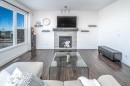 498 Sherwood Boulevard Nw, Calgary, AB  - Indoor Photo Showing Living Room With Fireplace 