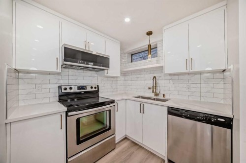 304 Huntbourne Hill Ne, Calgary, AB - Indoor Photo Showing Kitchen With Double Sink With Upgraded Kitchen