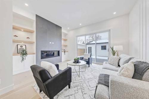 1728 19 Avenue Nw, Calgary, AB - Indoor Photo Showing Living Room With Fireplace