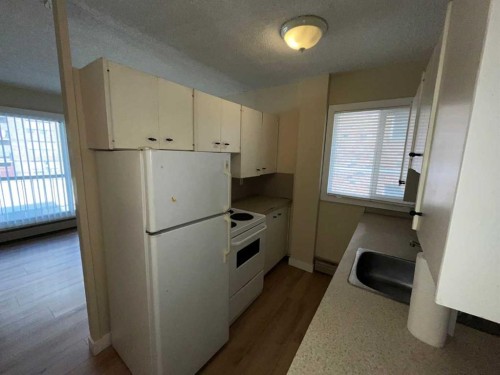 416-1222 13 Avenue Sw, Calgary, AB - Indoor Photo Showing Kitchen