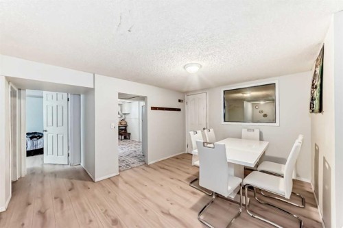 2208 47 Street Se, Calgary, AB - Indoor Photo Showing Dining Room