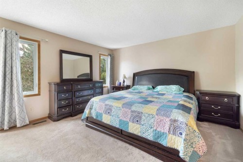 156 Woodfield Road Sw, Calgary, AB - Indoor Photo Showing Bedroom