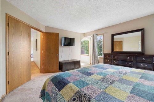 156 Woodfield Road Sw, Calgary, AB - Indoor Photo Showing Bedroom