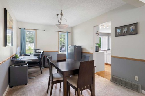 156 Woodfield Road Sw, Calgary, AB - Indoor Photo Showing Dining Room
