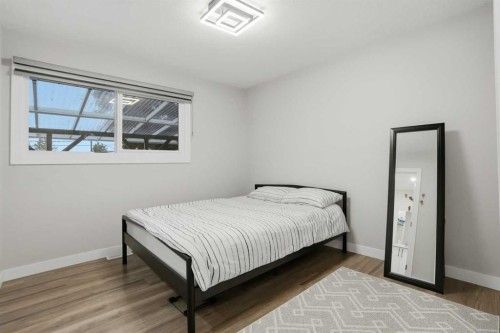 236 Fairview Drive Se, Calgary, AB - Indoor Photo Showing Bedroom