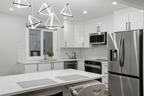 236 Fairview Drive Se, Calgary, AB - Indoor Photo Showing Kitchen With Stainless Steel Kitchen With Upgraded Kitchen