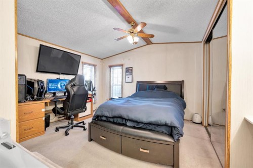 254 Erin Woods Circle Se, Calgary, AB - Indoor Photo Showing Bedroom