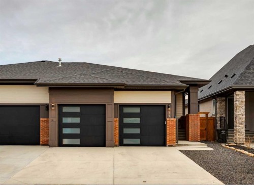 14 Cranbrook Common Se, Calgary, AB - Outdoor With Facade