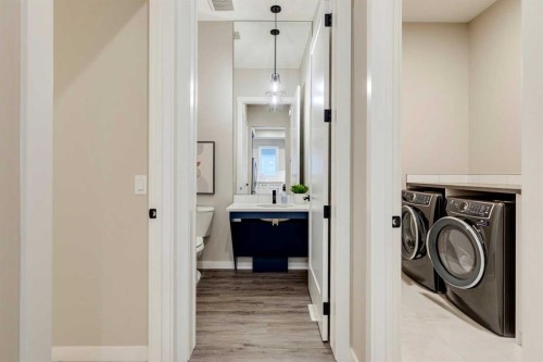 14 Cranbrook Common Se, Calgary, AB - Indoor Photo Showing Laundry Room