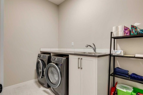 14 Cranbrook Common Se, Calgary, AB - Indoor Photo Showing Laundry Room