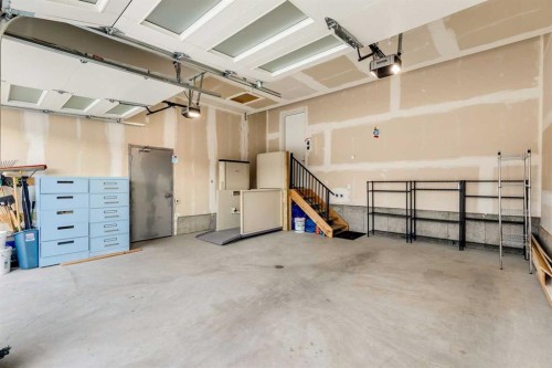 14 Cranbrook Common Se, Calgary, AB - Indoor Photo Showing Garage