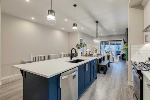 14 Cranbrook Common Se, Calgary, AB - Indoor Photo Showing Kitchen With Upgraded Kitchen