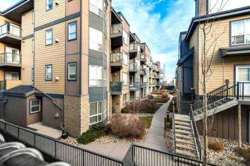 205-2440 34 Avenue Sw, Calgary, AB - Outdoor With Balcony With Facade