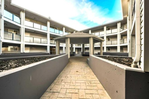 205-2440 34 Avenue Sw, Calgary, AB - Outdoor With Balcony