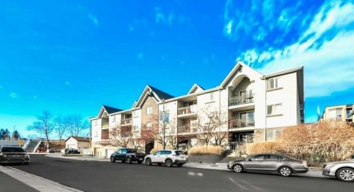 205-2440 34 Avenue Sw, Calgary, AB - Outdoor With Balcony With Facade