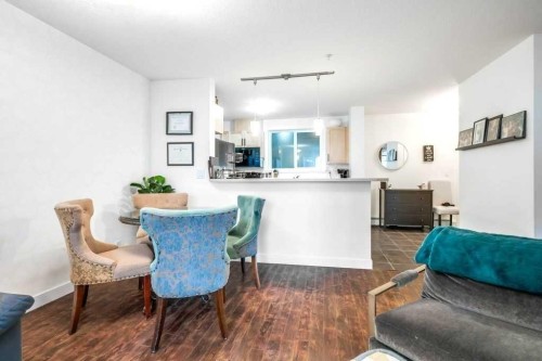 205-2440 34 Avenue Sw, Calgary, AB - Indoor Photo Showing Dining Room