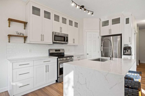 366 Bridleridge View Sw, Calgary, AB - Indoor Photo Showing Kitchen With Upgraded Kitchen