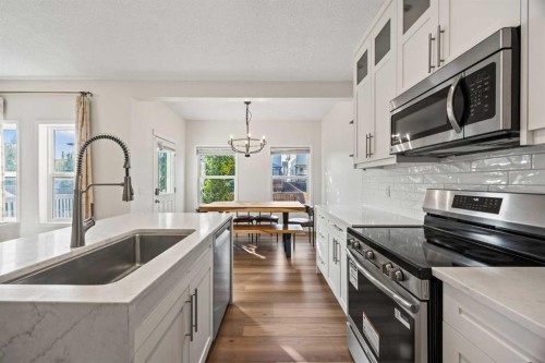 366 Bridleridge View Sw, Calgary, AB - Indoor Photo Showing Kitchen With Upgraded Kitchen