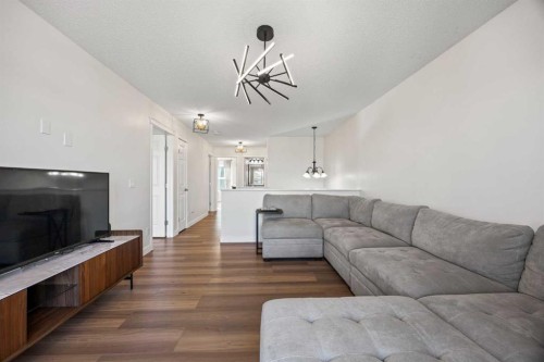 366 Bridleridge View Sw, Calgary, AB - Indoor Photo Showing Living Room