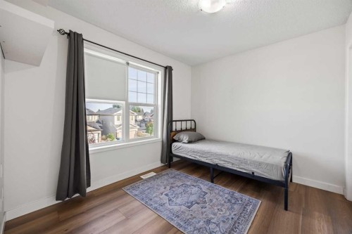 366 Bridleridge View Sw, Calgary, AB - Indoor Photo Showing Bedroom