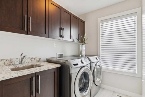 176 Cranarch Crescent Se, Calgary, AB - Indoor Photo Showing Laundry Room