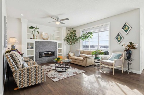176 Cranarch Crescent Se, Calgary, AB - Indoor Photo Showing Living Room With Fireplace