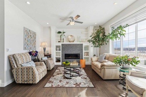 176 Cranarch Crescent Se, Calgary, AB - Indoor Photo Showing Living Room With Fireplace