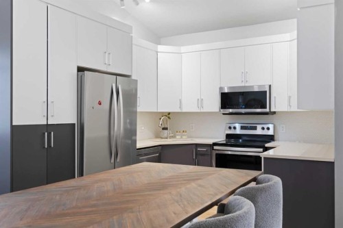 53 Riverside Crescent Se, Calgary, AB - Indoor Photo Showing Kitchen With Upgraded Kitchen