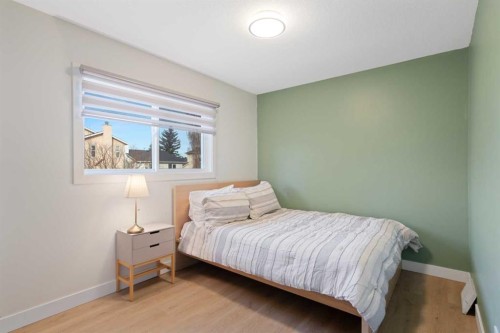 53 Riverside Crescent Se, Calgary, AB - Indoor Photo Showing Bedroom