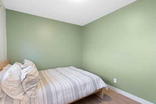 53 Riverside Crescent Se, Calgary, AB - Indoor Photo Showing Bedroom